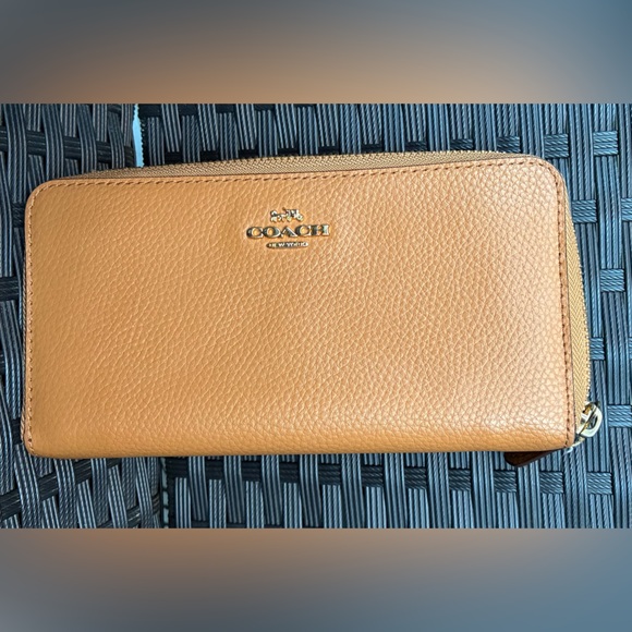 Coach Handbags - Coach Zip-Around Pebbled Leather Wallet in Tan